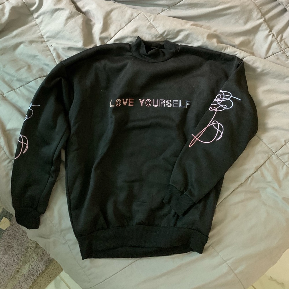 A BTS sweatshirt.